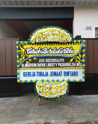 Papan Bunga Duka di Delang